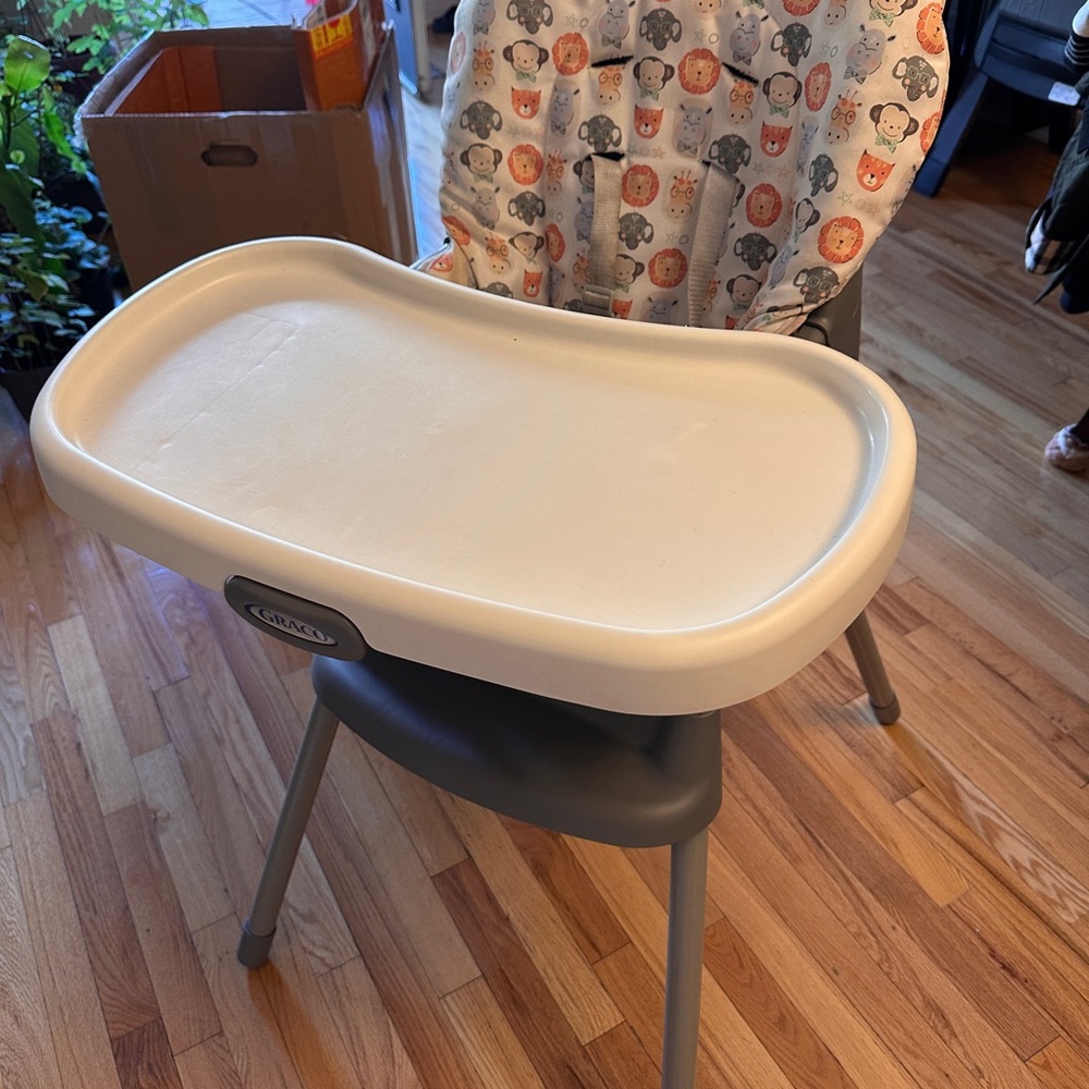 Gray and White High Chair with Tray
